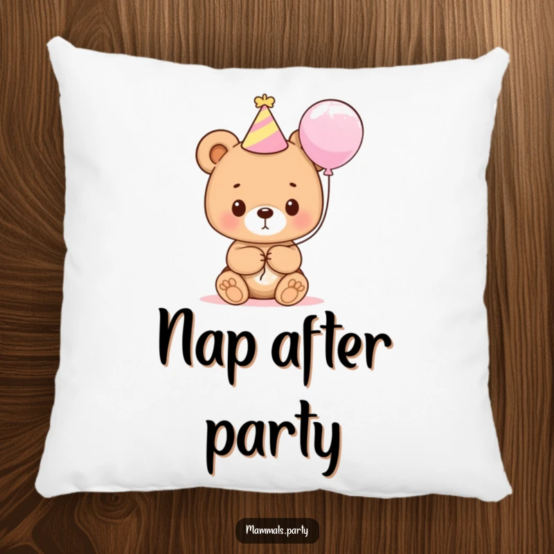 Funny, cute bear cub wearing a party hat and holding a balloon, presented as a soft, huggable pillow.