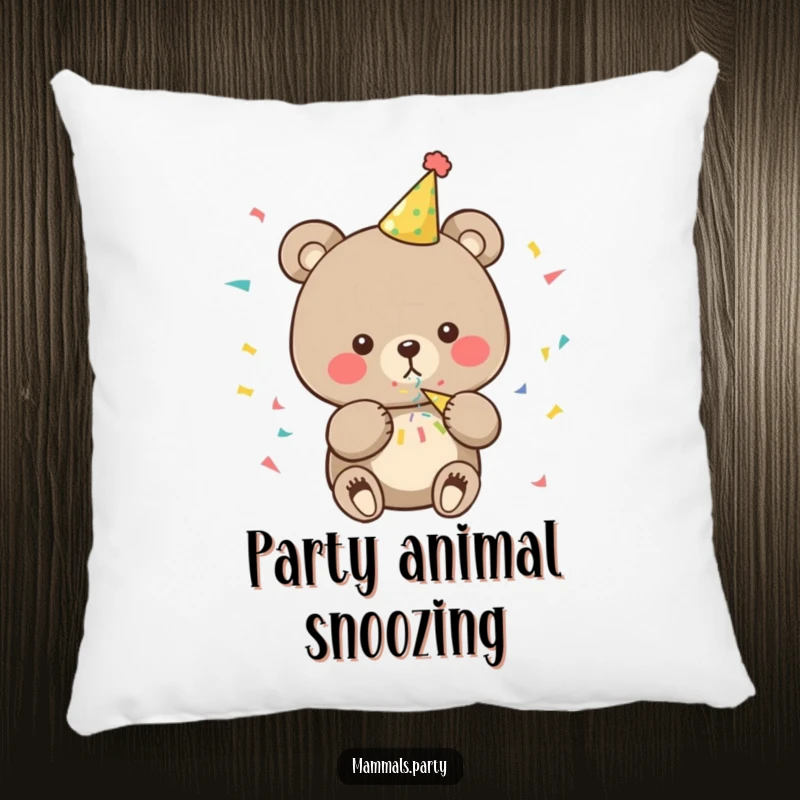 Funny bear pillow with a detailed illustration of a character in a party hat, blowing confetti, adding comfort and humor.