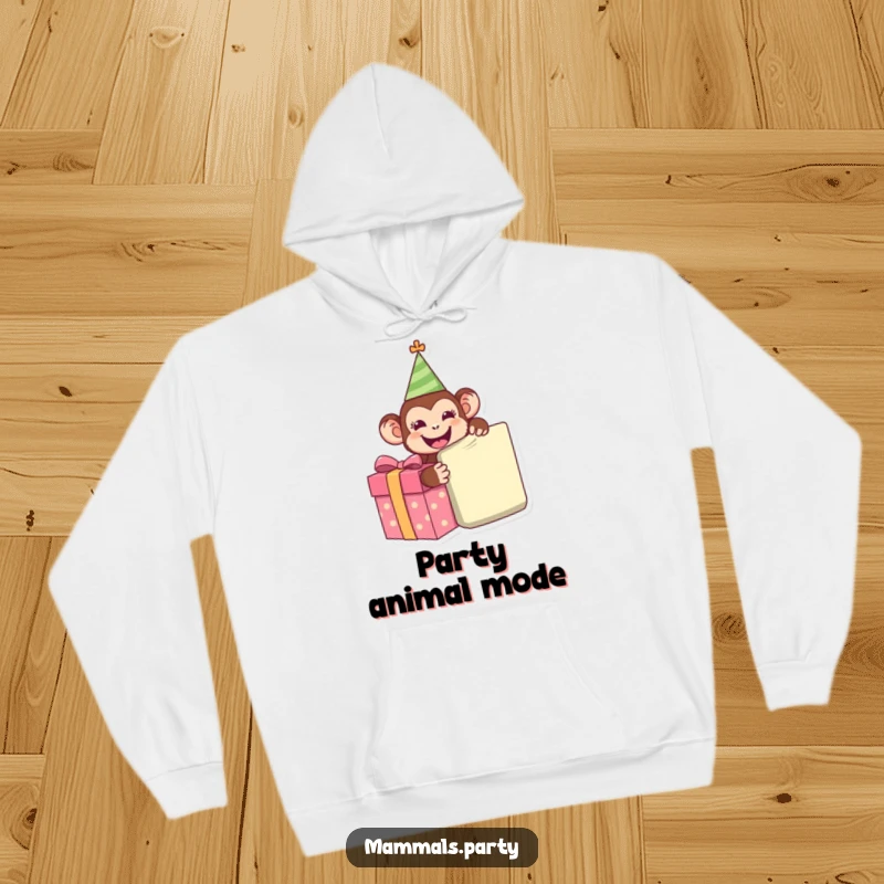 Funny Monkey Hoodie showing a happy monkey wearing a party hat, eagerly unwrapping a giant gift, bringing warmth and festive spirit.