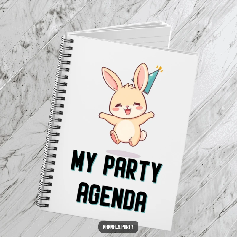 Funny notebook cover depicting an excited bunny bouncing with ears flopped back, wearing a party hat, perfect for journaling.