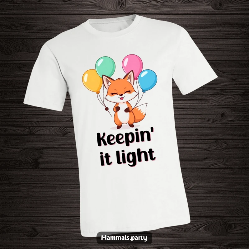Funny kawaii fox with a sly grin, expertly juggling multicolored balloons, a cute and funny woodland creature tee.