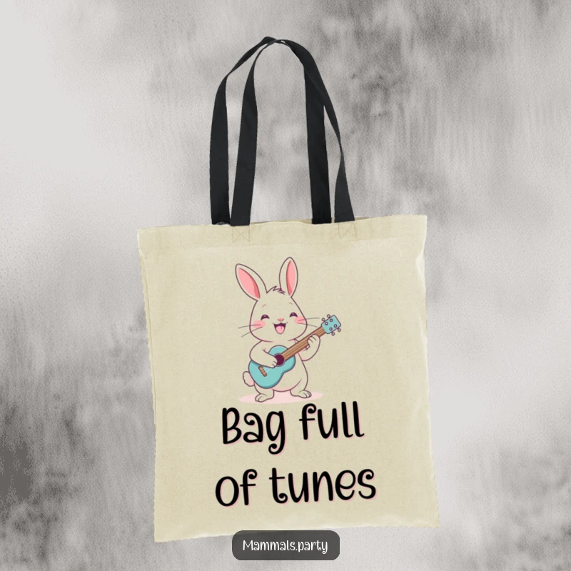Funny rabbit with a grin, strumming a tiny guitar, printed on a tote bag for carrying music and essentials.