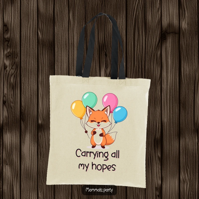 Funny kawaii fox with a sly grin, juggling colorful balloons, on a durable tote bag.